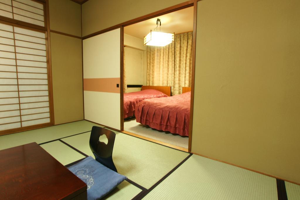 Imakuni Ryokan Takacsiho Szoba fotó